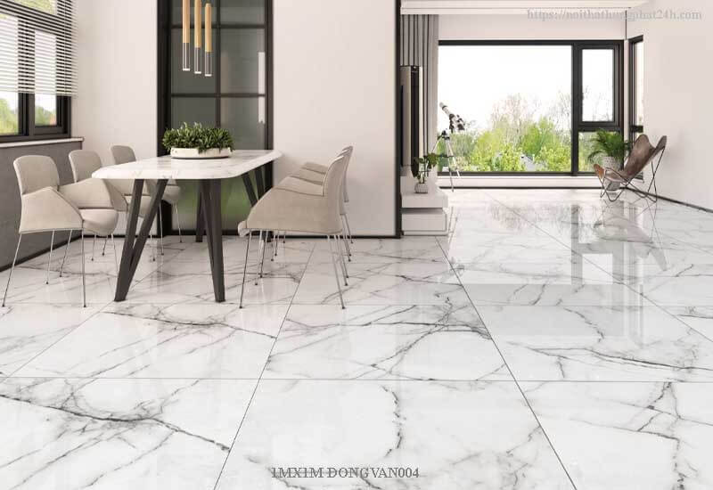 Gạch Đồng Tâm 1000x1000 DONGVAN004-FP-H+ với bề mặt bóng kháng khuẩn, vân đá tự nhiên sang trọng và kích thước lớn, tôn lên vẻ đẹp hiện đại cho không gian.