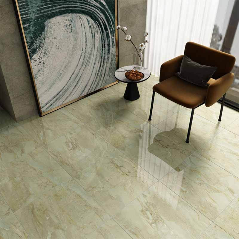 Gạch Đồng Tâm 600x600 TRANGAN002-FP được làm từ chất liệu Porcelain bền chắc, bề mặt bóng kính, hoa văn vân đá kem nâu hiện đại